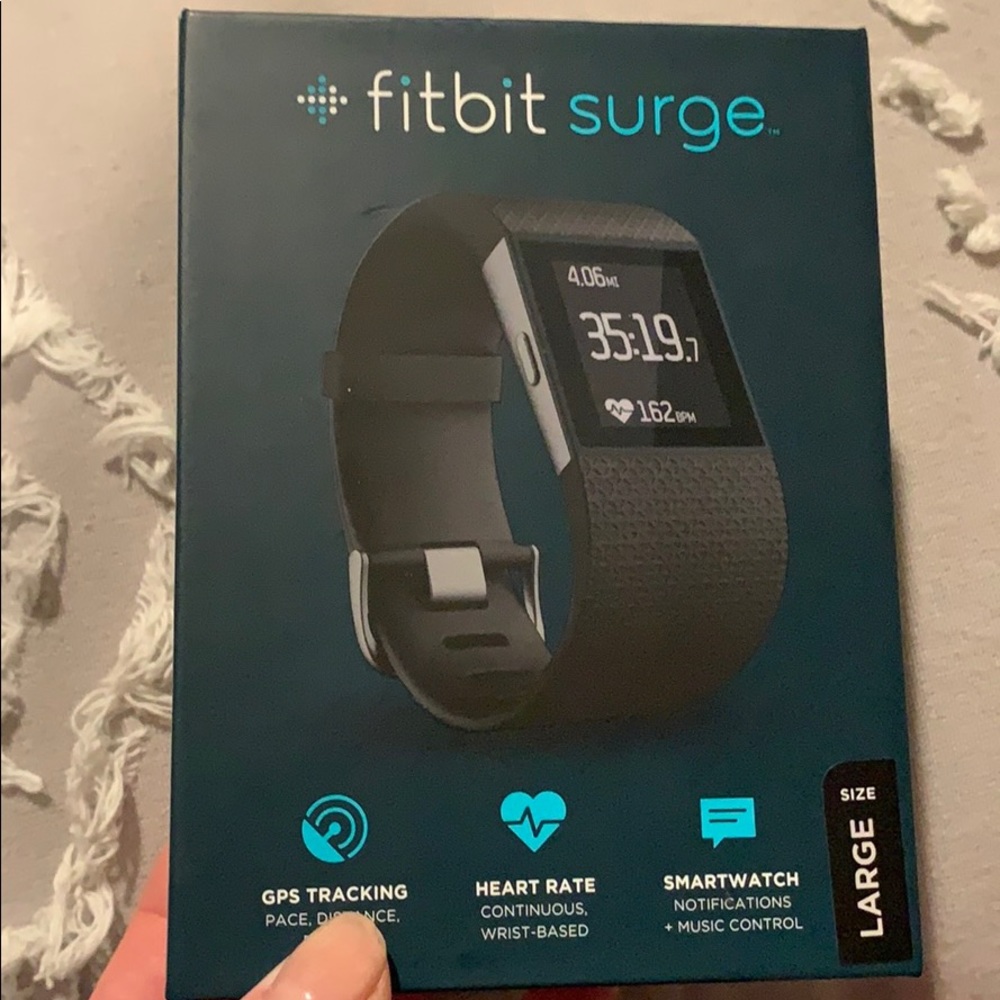 Never opened Fitbit surge size large